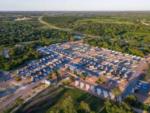 Aerial shot of sites and surrounding area at Stone Oak Ranch RV Resort - thumbnail