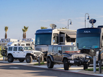 Jeeps next to rigs at Sun Outdoors San Diego Bay - thumbnail