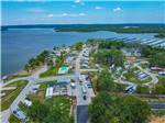 An aerial view of the campsites by the water at FOUR CORNERS RV RESORT - thumbnail