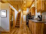 The kitchen area in the rental cabin at FOUR CORNERS RV RESORT - thumbnail