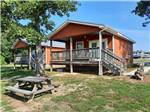 View larger image of Front view of two cabins at MOUNTAIN TOP RETREAT CABINS  CAMPGROUND image #6