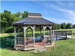 View larger image of Gazebo on a pond with a deck at MOUNTAIN TOP RETREAT CABINS  CAMPGROUND image #9