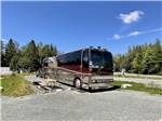 Class A Motorhome parked on RV site at WEST BAY ACADIA RV CAMPGROUND - thumbnail
