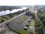 View larger image of An aerial view of the campsites and river at RIVER RUN RV PARK image #3