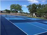 The blue pickleball courts at MINEOLA CIVIC CENTER & RV PARK - thumbnail