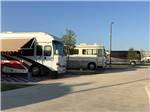 View larger image of A row of motorhomes in paved sites at LAKESHORE RV RESORT image #10