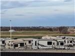 View larger image of Motorhomes in campsites at FLATLAND RV PARK image #4