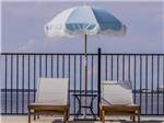 View larger image of Lounge chairs overlooking water at BILOXI BAY RV RESORT AND MARINA image #4