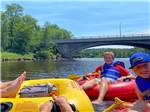 View larger image of Kids floating down the river on inner tubes at MONT DU LAC RESORT image #12