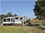 View larger image of Fifth wheel parked at campsite at SUMMIT RV RESORT image #1
