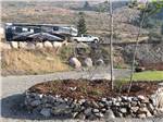 View larger image of Fifth wheel traveling onsite at SUMMIT RV RESORT image #4