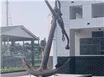 View larger image of A large rusty anchor at MAMAWS COASTAL HIDEAWAY image #11