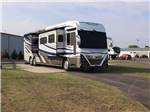 A motorhome parked in a paved site at BAYFRONT RESORT AT CROSS VIEW - thumbnail