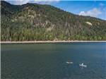 View larger image of An aerial view of people paddle boarding at WHISTLIN JACKS OUTPOST LODGE image #6