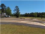 A view of empty paved RV sites at PEBBLE HILL RV RESORT - thumbnail