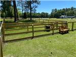 Fenced dog area at Pebble Hill RV Resort - thumbnail