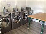 The washers in the laundry room at KELLER'S KOVE CABIN AND RV RESORT - thumbnail