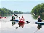 A group of people paddling at AT EASE CAMPGROUND & MARINA - thumbnail