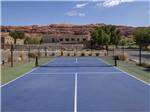 POV of tennis courts at PORTAL RV RESORT - thumbnail