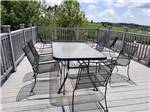 View larger image of A patio table on the deck at MEDALLION CAMPGROUND - BRISTOL MOTOR SPEEDWAY image #11