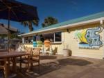 Bar and grill with outdoor seating at OCEAN GROVE RV RESORT - thumbnail