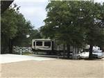 View larger image of A row of paved RV sites at BIG OAK RV RESORT image #2