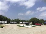 View larger image of The gravel roads between the paved RV sites at BIG OAK RV RESORT image #10