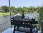 A large bbq pit facing out to the fountain at ROCKPORT RV RANCH - thumbnail