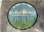 The Rollin' Homes logo on the floor at ROLLIN' HOME RV PARK - thumbnail