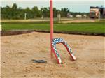 A horseshoe with stars in the sand at BUDA PLACE RV RESORT - thumbnail