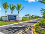 The front entrance sign and driveway at THE SURF RV RESORT - thumbnail