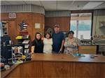 Employees standing behind the desk at SUGAR VALLEY RV RESORT BY RJOURNEY - thumbnail