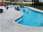 People enjoying the swimming pool at PORT ST JOE RV RESORT - thumbnail