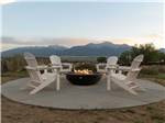 Chairs gathered around fire pit at BV OVERLOOK CAMP & LODGING - thumbnail