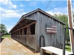View larger image of The wooden horse stalls at QUIET WOODS GREEN RIVER STABLES HORSE CAMP  RV PARK image #7