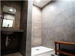 The modern shower stalls at LANDMARK TRAVEL CENTER RV PARK - thumbnail