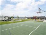 The basketball court next to a RV site at POST FALLS RV CAMPGROUND - thumbnail