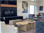 The modern fireplace and indoor seating area at CENTER POINT RV PARK - thumbnail