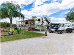 Fifth wheel parked at campsite at PORT O'CONNOR RV PARK - thumbnail