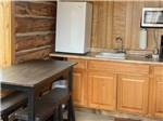 The kitchen area in the log cabin at HOVER CAMP - thumbnail