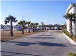 Road leading to RV and park model sites at TOPSAIL SOUND RV PARK - thumbnail