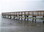 Pier extending out into large body of water at TOPSAIL SOUND RV PARK - thumbnail