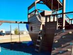 Play area at site Cherokee Creek RV Park - thumbnail