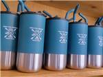 Drinking cups with the campground logo on them at PADDLE TRAIL CAMPGROUND ON THE GREEN RIVER - thumbnail