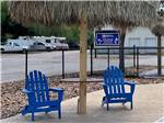 Two lounge chairs under a hut at LAKE CONROE RV CAMPGROUND BY RJOURNEY - thumbnail