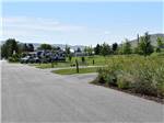 A row of empty paved RV sites at CONKLIN LANDING RV PARK - thumbnail