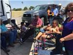 Group of people in chairs at COYOTE KEETH'S RV PARK - thumbnail