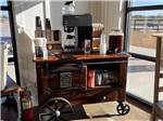 The complimentary coffee cart at YELLOW ROSE RV RESORT - thumbnail