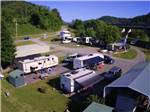 Aerial view of trailers parked in RV sites at NEW RIVER BRIDGE FAMILY CAMPGROUND - thumbnail