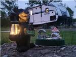 A bear statue next to a RV site at RINGLER FAMILY CAMPGROUND - thumbnail